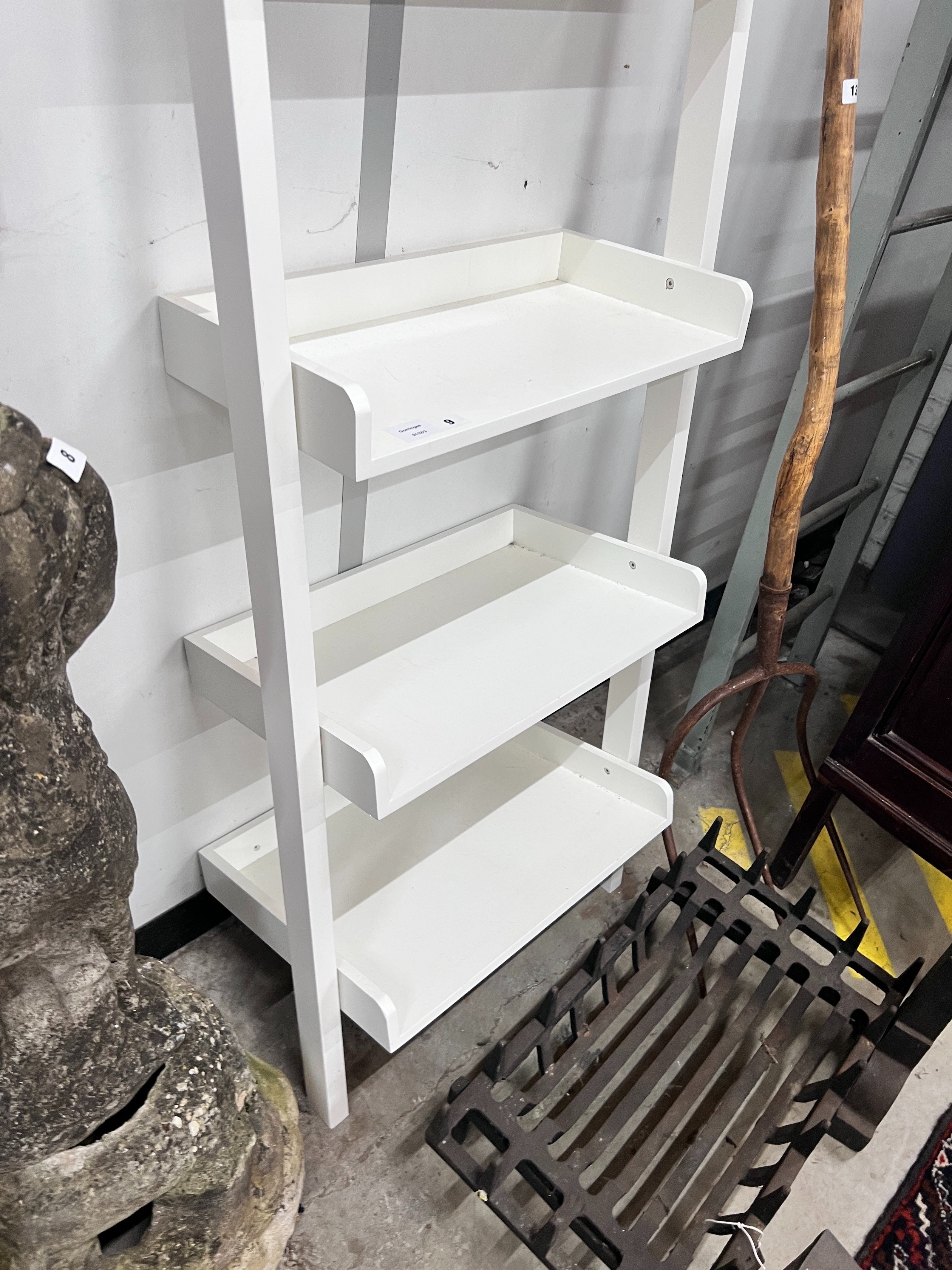 A contemporary graduated shelving unit, height 190cm *Please note the sale commences at 9am.